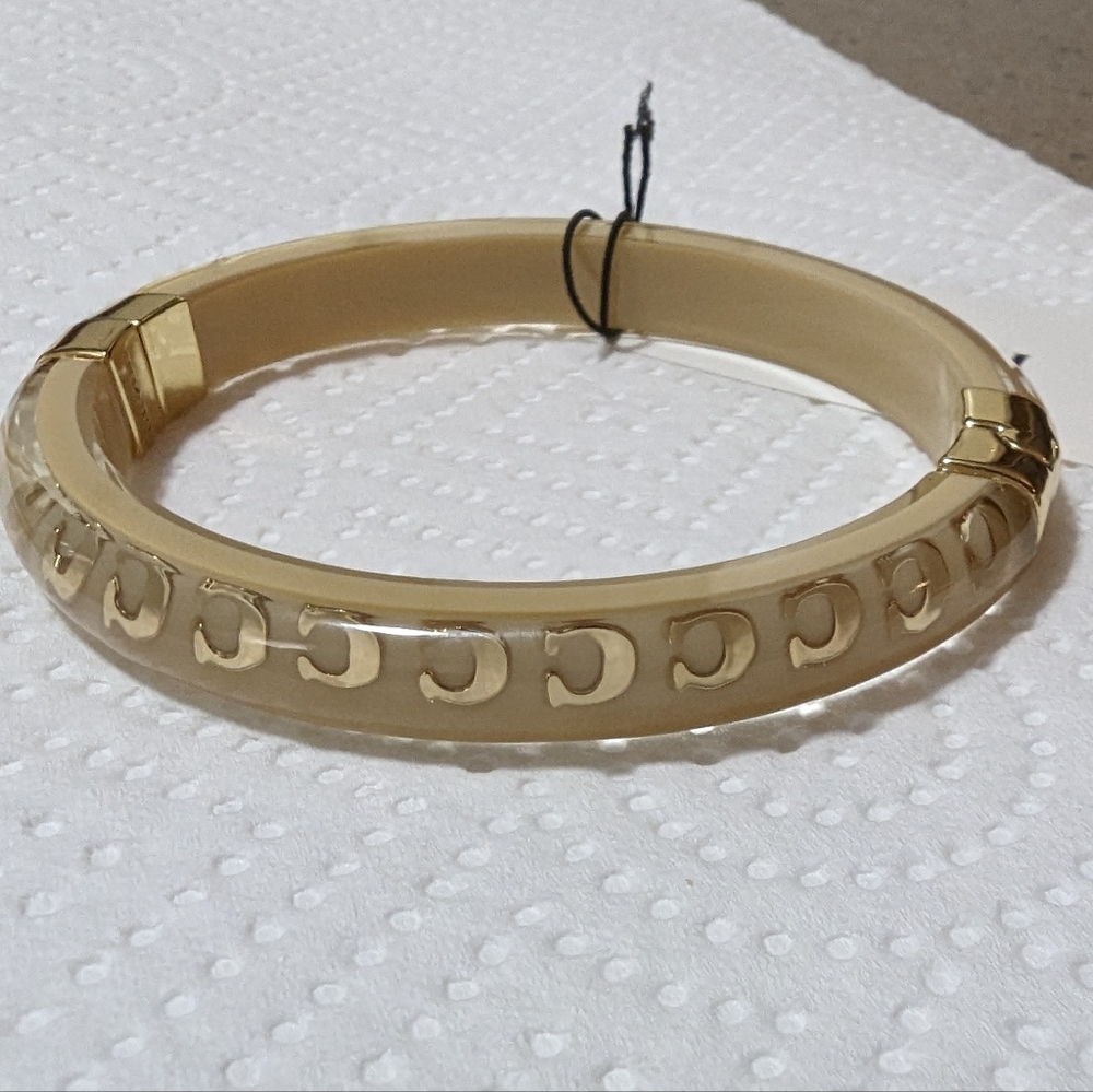 NWT LUCITE CREAM & GOLD COACH BRACELET
ABSOLUTELY SEXY IN SEE THRU - Picture 7 of 11